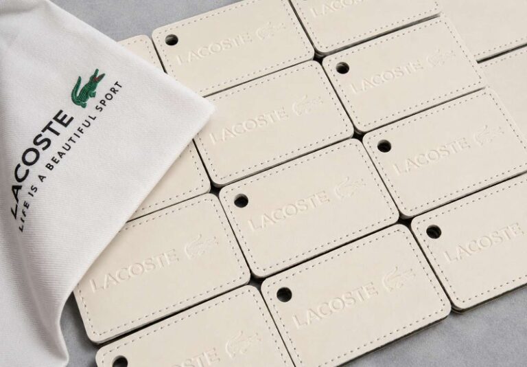 Lacoste Blind Debossed Cream Leather Luggage Tags