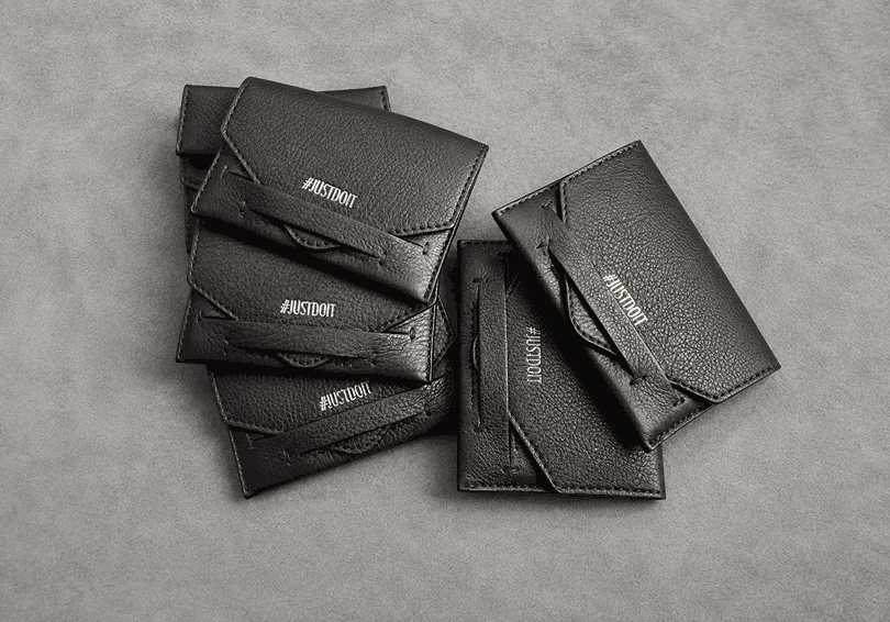 Nike Justdoit Silver Embossed Leather Card Wallets