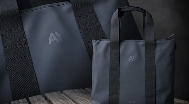 850 Rains bags embossed with AI branding by Krintech Ltd for a high-volume corporate gifting project
